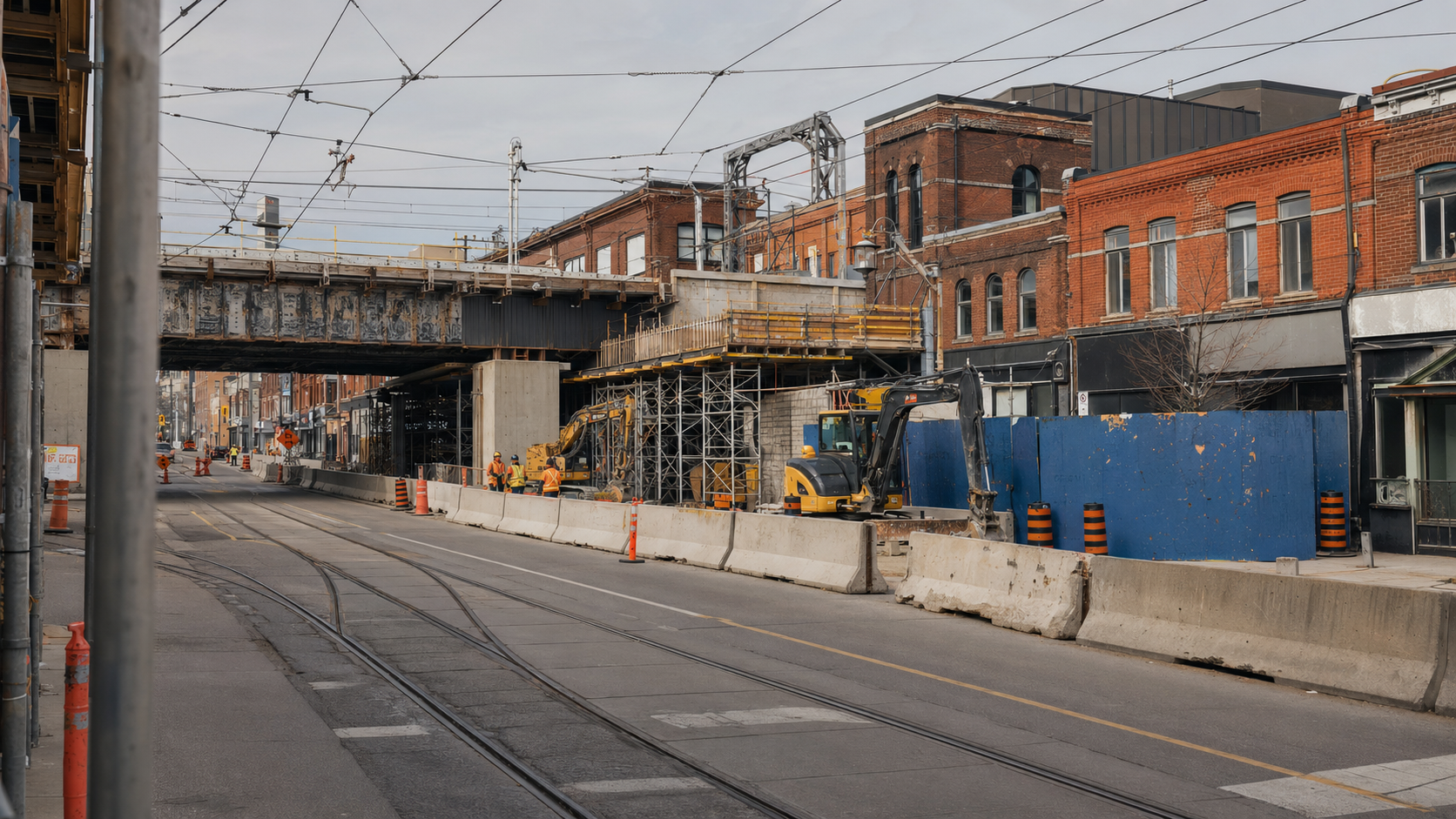 Construction barriers and equipment beside streetcar tracks in Toronto’s east end